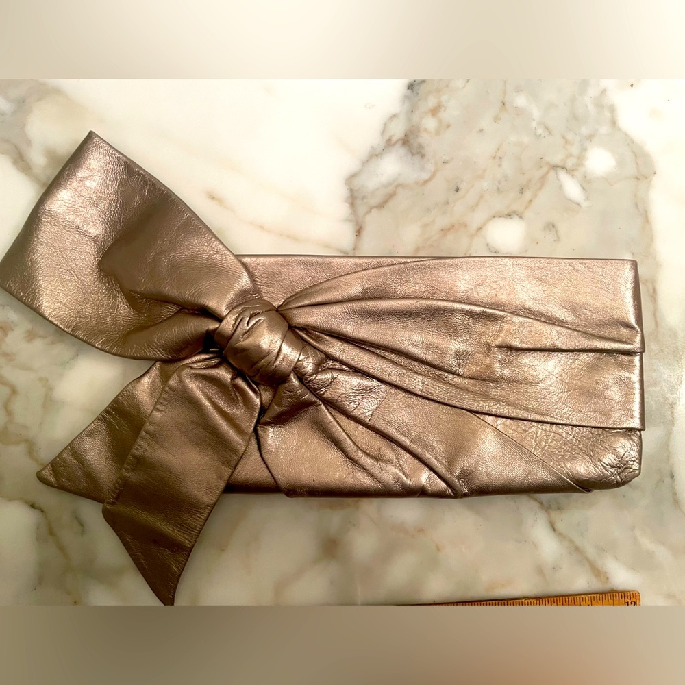 Valentino clutch, pearl silver leather, used once in fashion show. silver/gold.